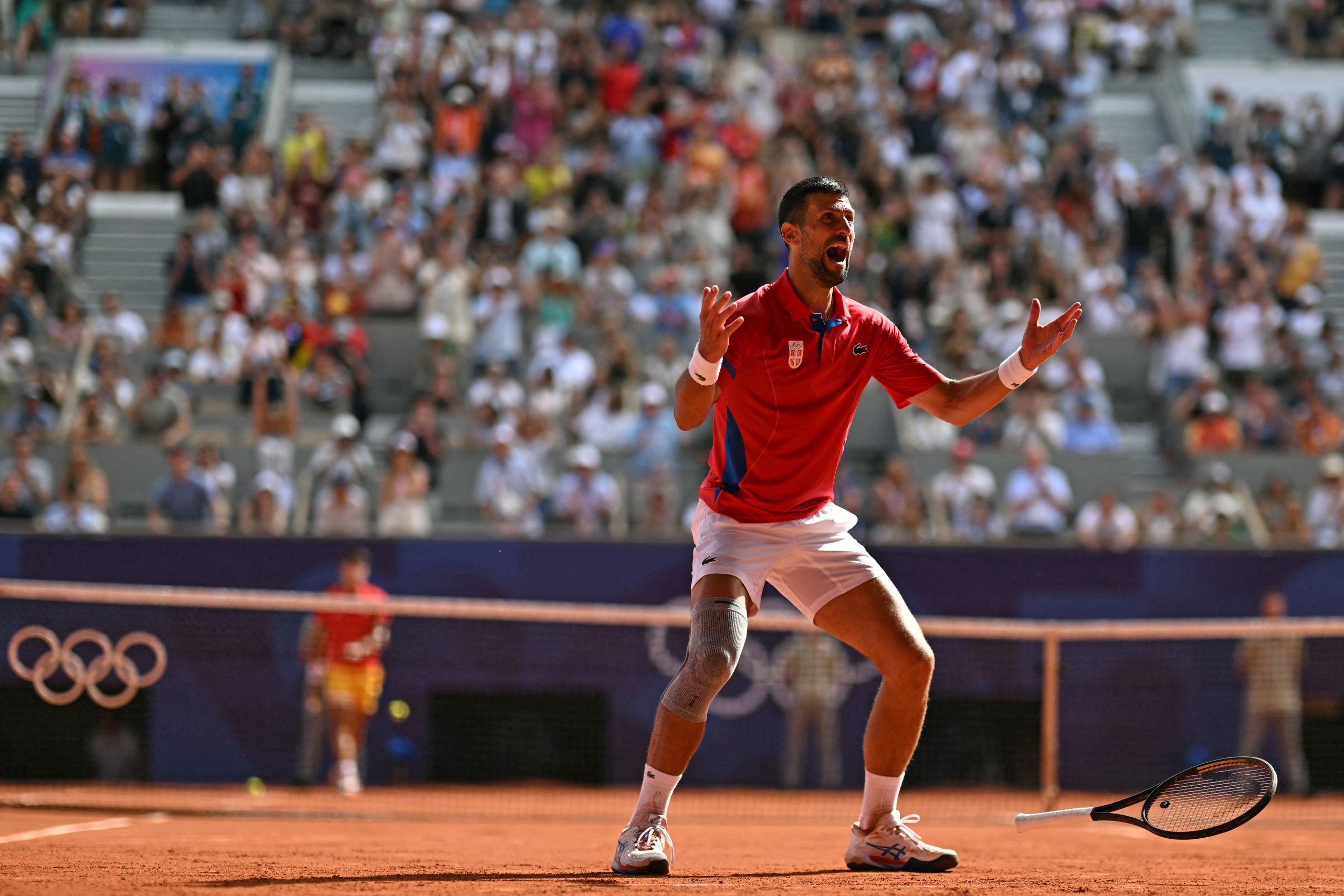 Novak Đoković osvojio prvu zlatnu olimpijsku medalju napetom, briljantnom pobedom nad Karlosom Alkarazom
