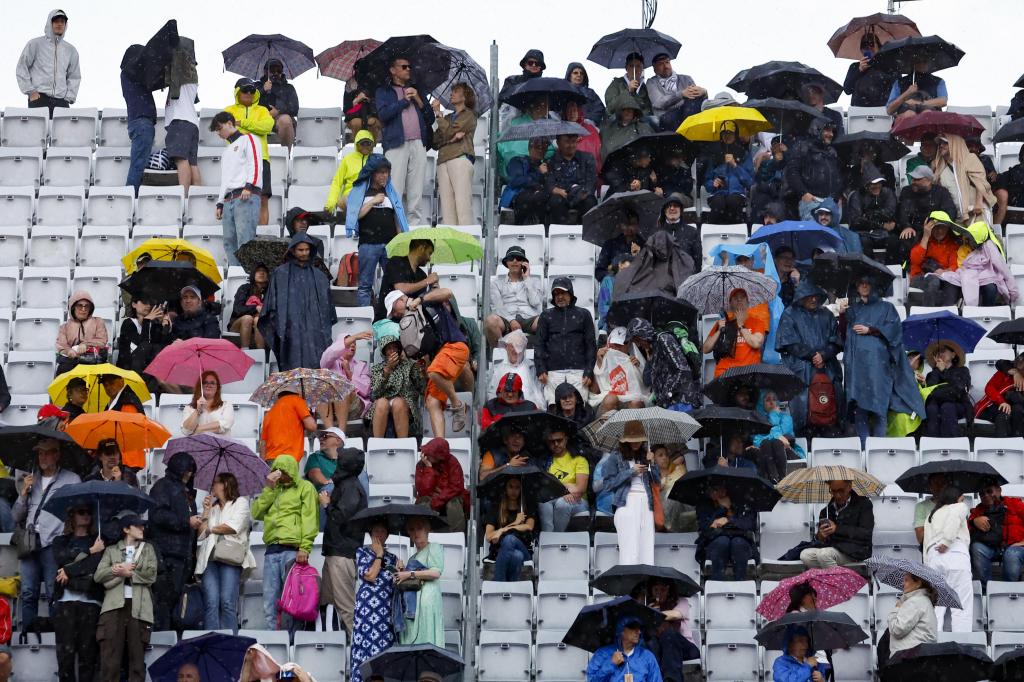 Navijači na kiši u Foro Italico