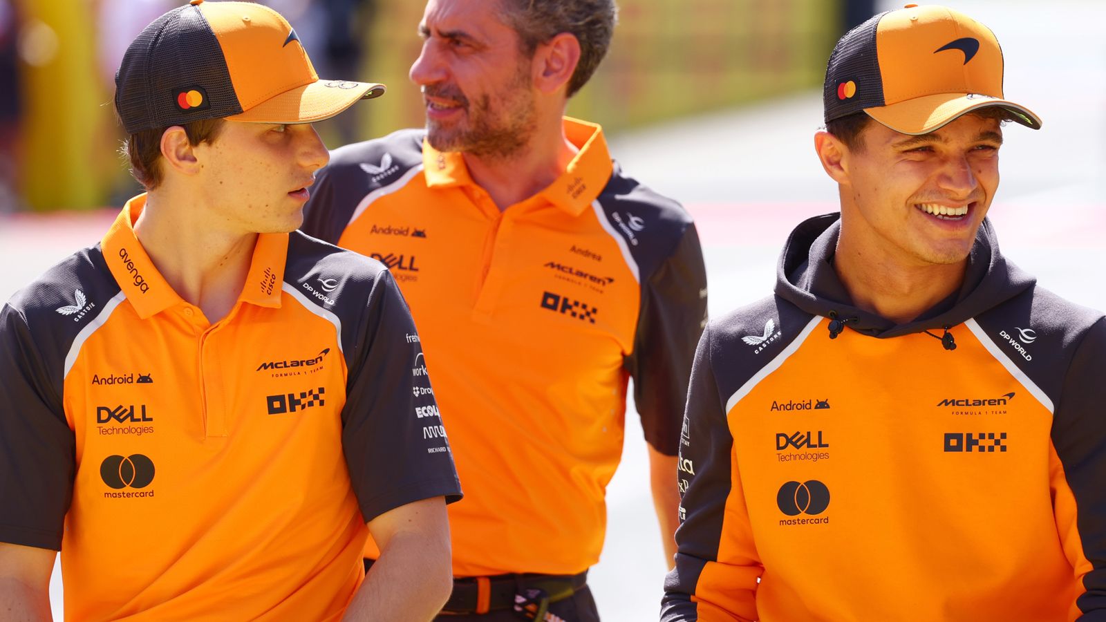 Oscar Piastri and Lando Norris with McLaren team principal Andrea Stella