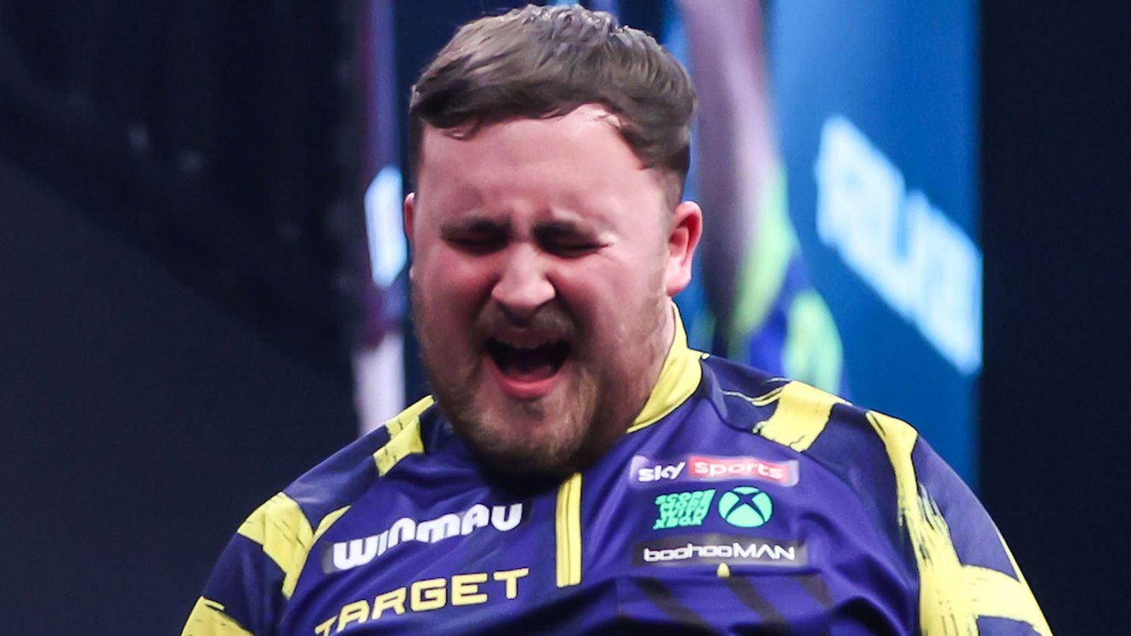 Luke Littler celebrates after winning the Winmau World Masters