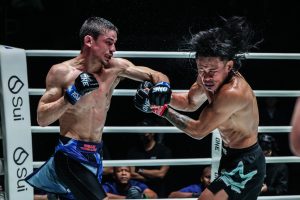 MMA fighter Willie van Rooyen cracks Jeremy Miado in the head