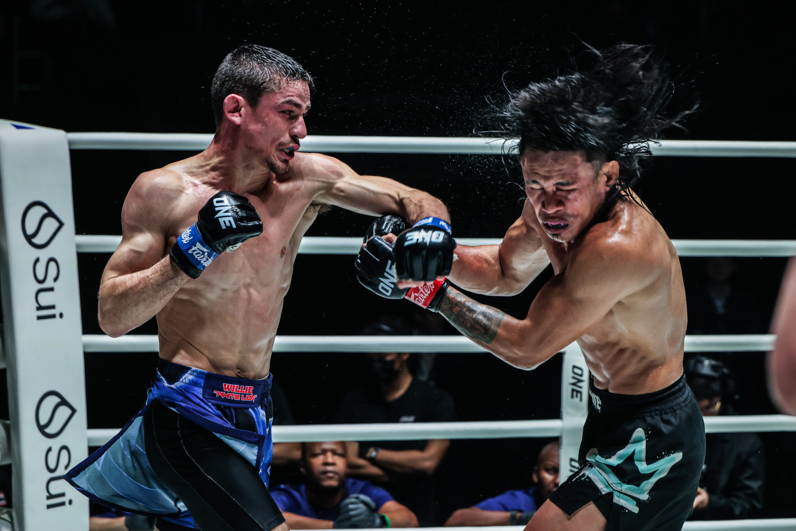 MMA fighter Willie van Rooyen cracks Jeremy Miado in the head