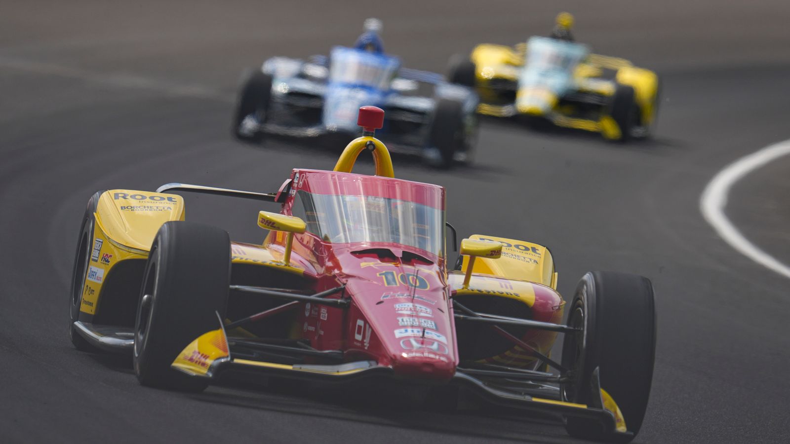 Alex Palou, of Spain, drives through the first turn during practice for the Indianapolis 500 auto race at Indianapolis Motor Speedway in Indianapolis, Thursday, May 15, 2025. (AP Photo/Michael Conroy)