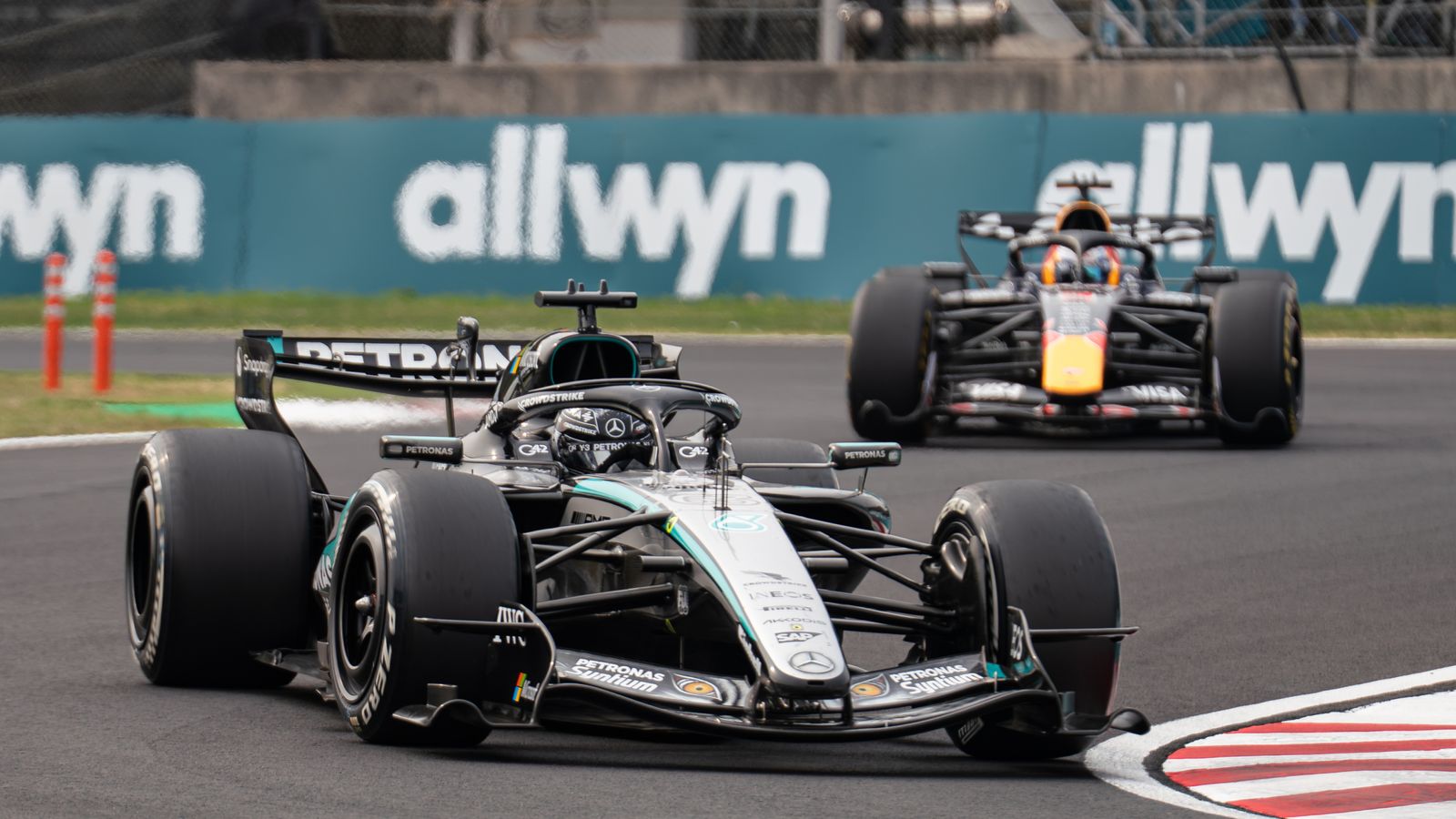 Mercedes-AMG Petronas F1 Team driver #63 George Russell from Great Britain leads Oracle Red Bull Racing driver #3 Max Verstappen from the Netherlands on track during the race at the 2026 Formula 1 Japanese Grand Prix, round 3 of the FIA Formula 1 World Championship, at Suzuka Circuit in Suzuka, Japan, on March 29, 2026. (Photo by Wan Mikhail Roslan/NurPhoto)