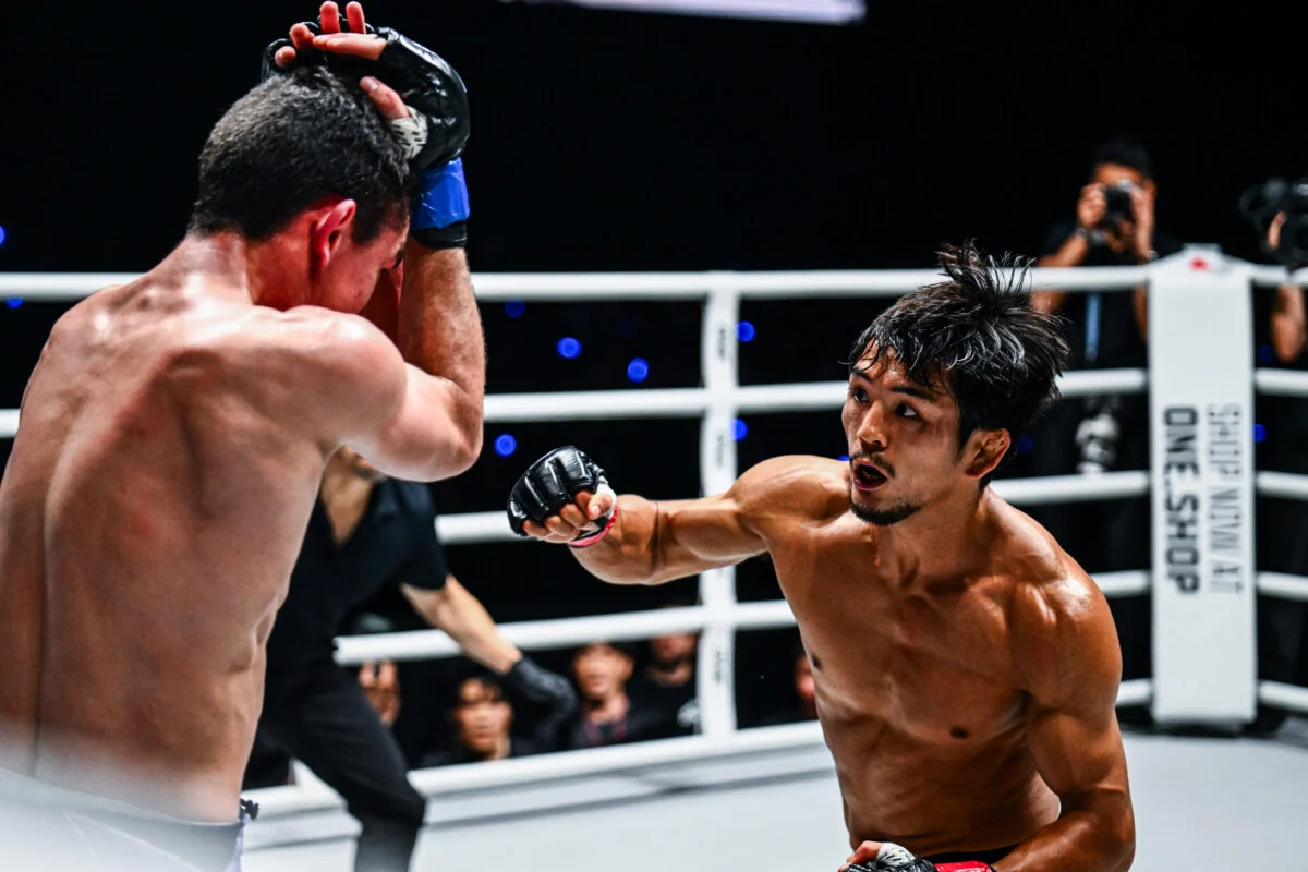 Yuya Wakamatsu goes to punch Willie van Rooyen