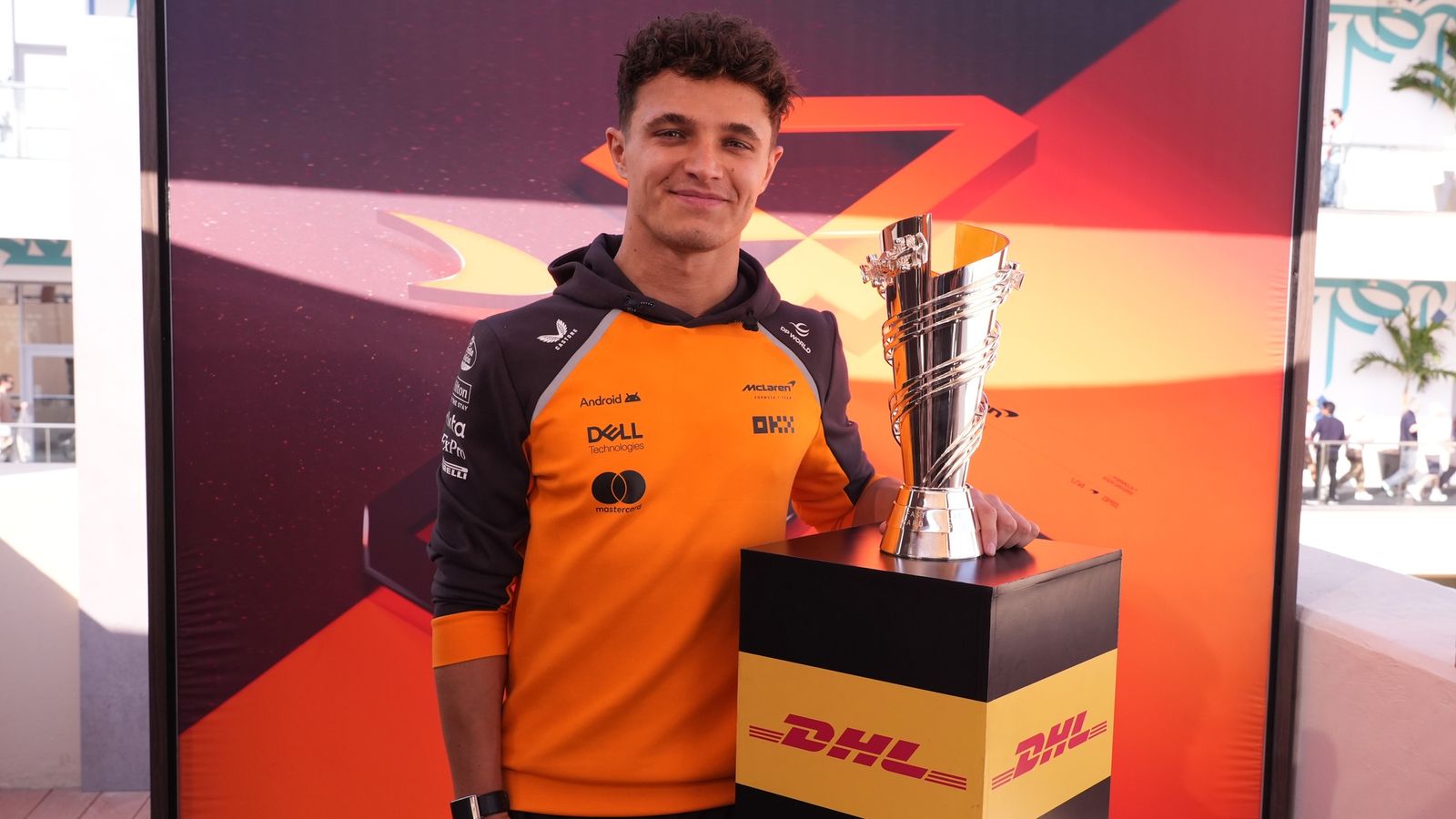Lando Norris with the DHL Fastest Lap award trophy for 2025