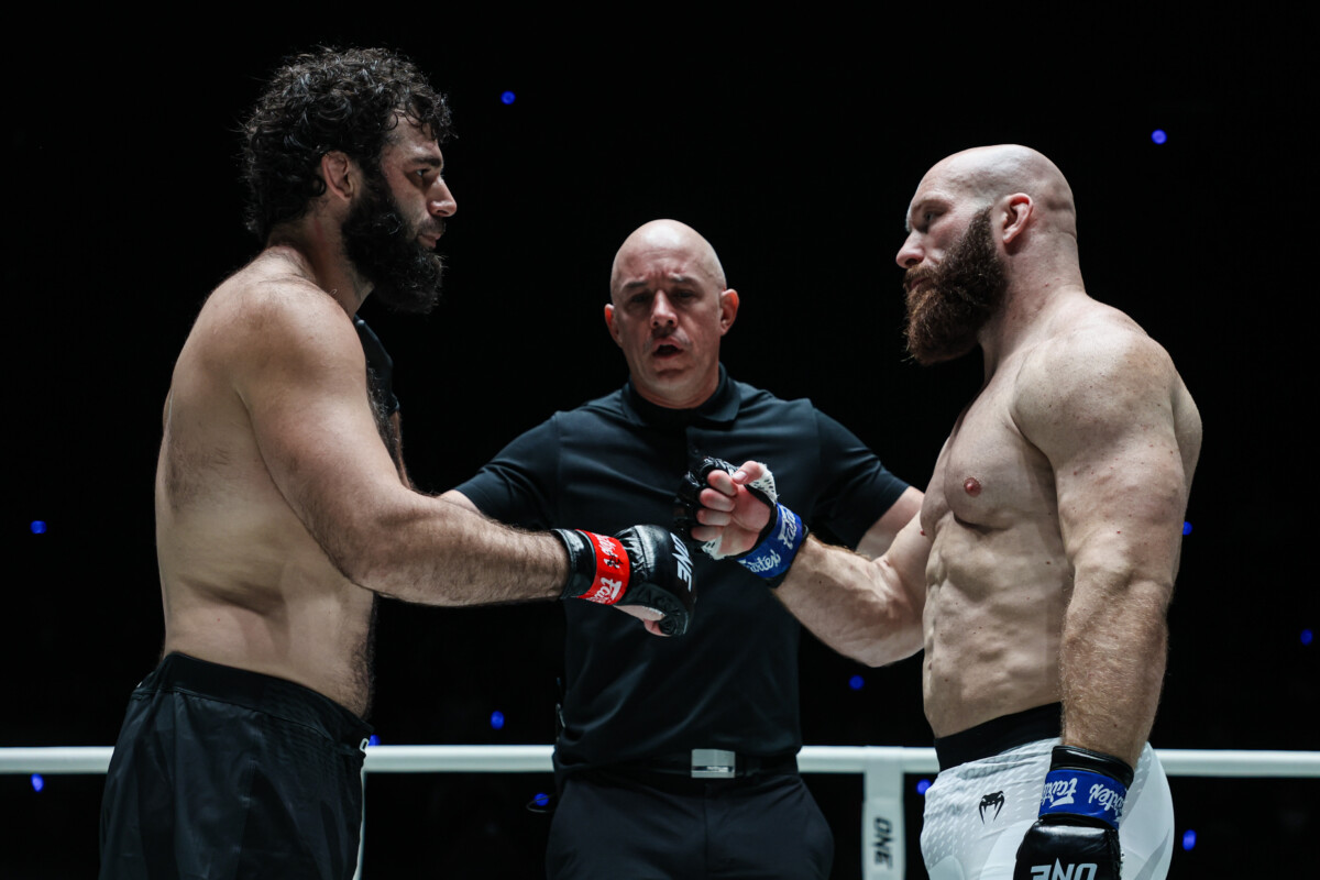 Shamil Erdogan and Paul Elliott touch gloves before their fight at ONE Fight Night 48